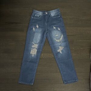 Dark blue ripped jeans